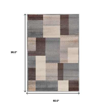 5' X 8' Gray Tan And Brown Patchwork Area Rug