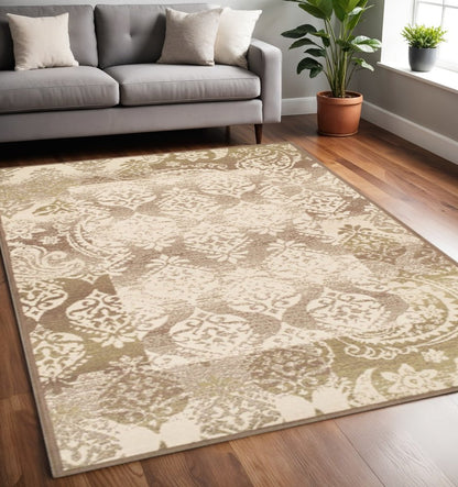 5' X 8' Beige And Brown Damask Distressed Area Rug