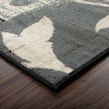 5' X 8' Beige Brown And Gray Floral Distressed Area Rug