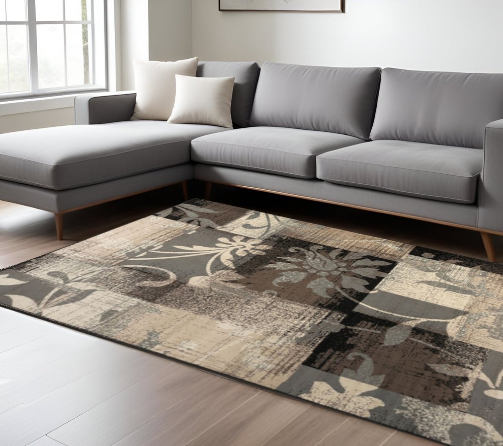 6' X 9' Beige Brown And Gray Floral Distressed Area Rug