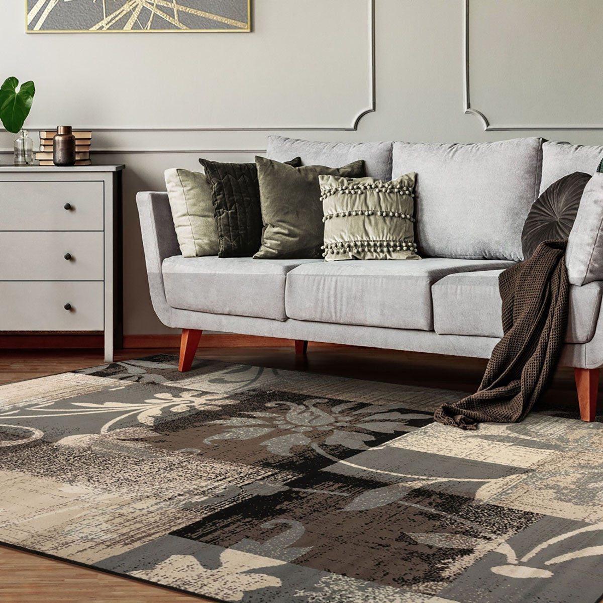 7' X 9' Beige And Gray Floral Power Loom Distressed Stain Resistant Area Rug