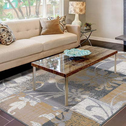 7' X 9' Beige And Black Floral Distressed Area Rug