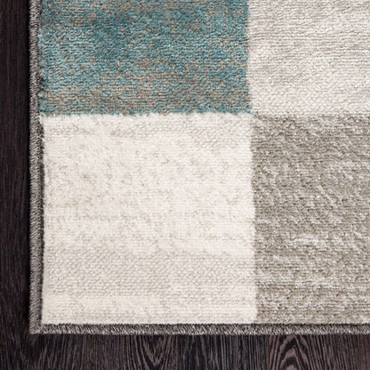 5' X 8' Teal Ivory And Gray Geometric Area Rug