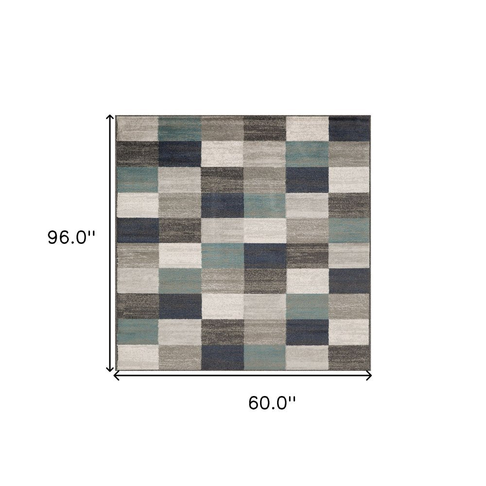 5' X 8' Teal Ivory And Gray Geometric Area Rug