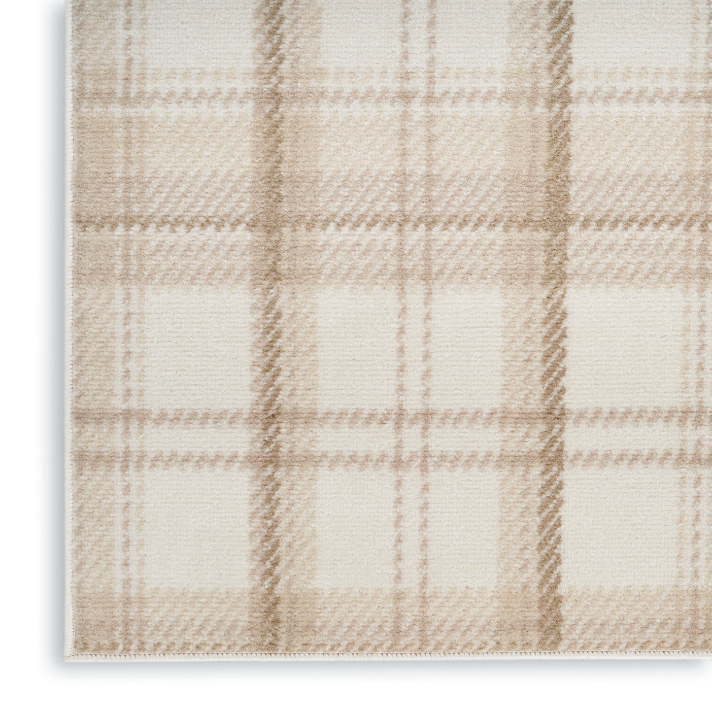 Rectangular beige plaid rug with soft woven texture in cream and tan tones.
