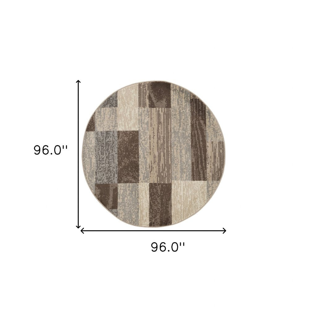 Round patchwork rug in beige, slate gray, and brown blocks, 96" diameter, cozy living room accessory.