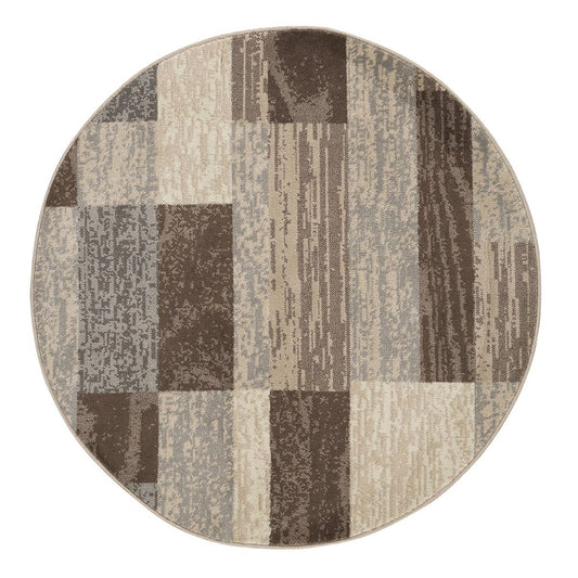 Circular rug with patchwork blocks in brown, taupe and beige tones; woven texture.
