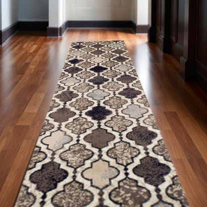 10' Ivory Brown And Black Quatrefoil Distressed Runner Rug