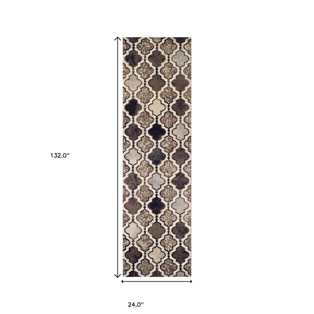 11' ivory, brown and black quatrefoil distressed runner rug