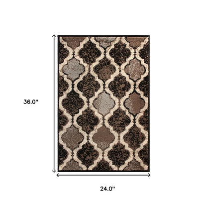 2' X 3' Brown Black And Ivory Quatrefoil Distressed Area Rug