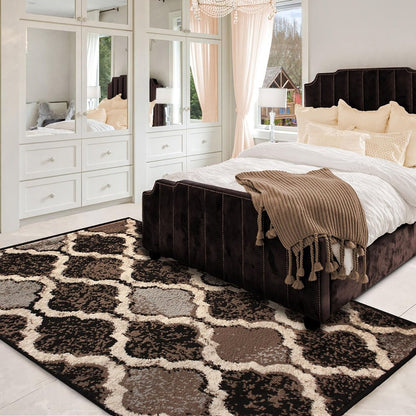 4' X 6' Brown Black And Ivory Quatrefoil Distressed Area Rug