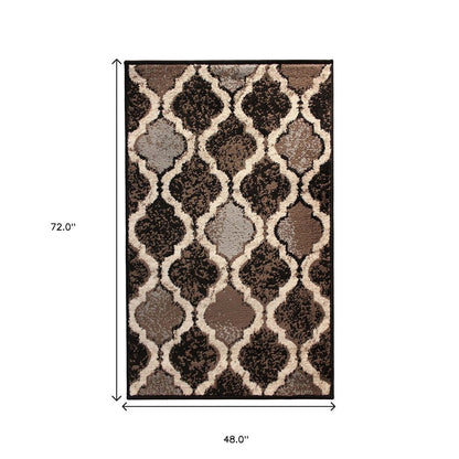 4' X 6' Brown Black And Ivory Quatrefoil Distressed Area Rug