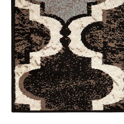 6' X 9' Brown Black And Ivory Quatrefoil Distressed Area Rug