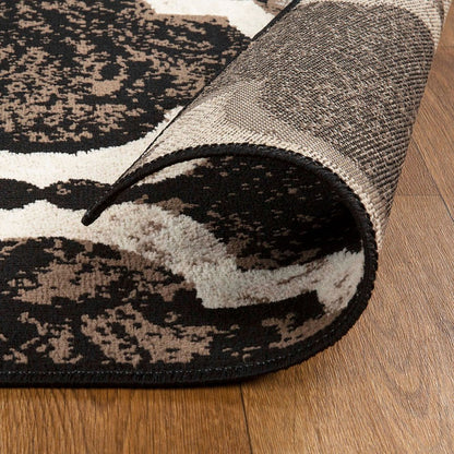 6' X 9' Brown Black And Ivory Quatrefoil Distressed Area Rug