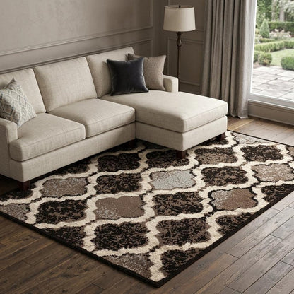 6' X 9' Brown Black And Ivory Quatrefoil Distressed Area Rug