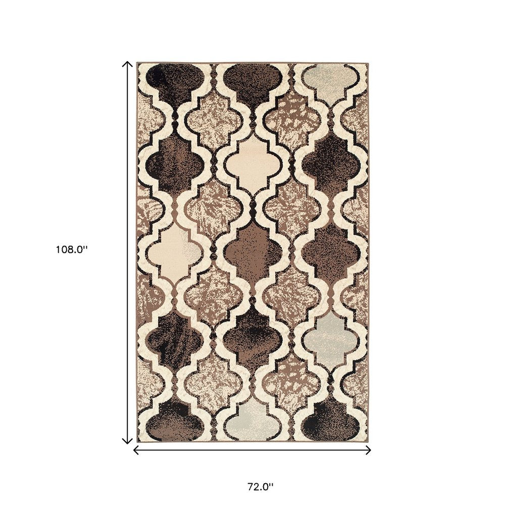 6' X 9' Ivory Brown And Black Quatrefoil Distressed Area Rug