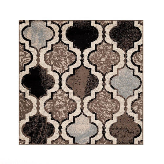 Square area rug with ivory, brown, black, beige and gray quatrefoil pattern.