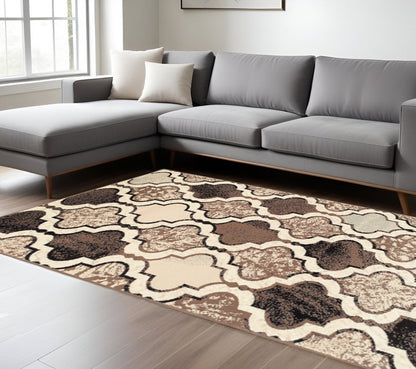 9' X 12' Ivory Brown And Black Quatrefoil Distressed Area Rug