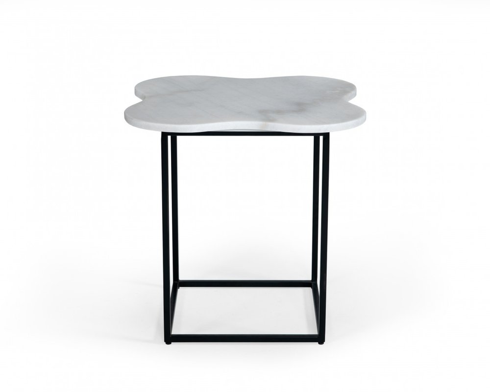 Irregular white marble top on a black metal free-form end table.