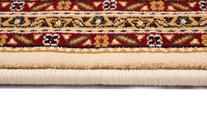 Beige and ivory oriental runner rug with cream fringe and gold/cream floral border; woven decorative rug.
