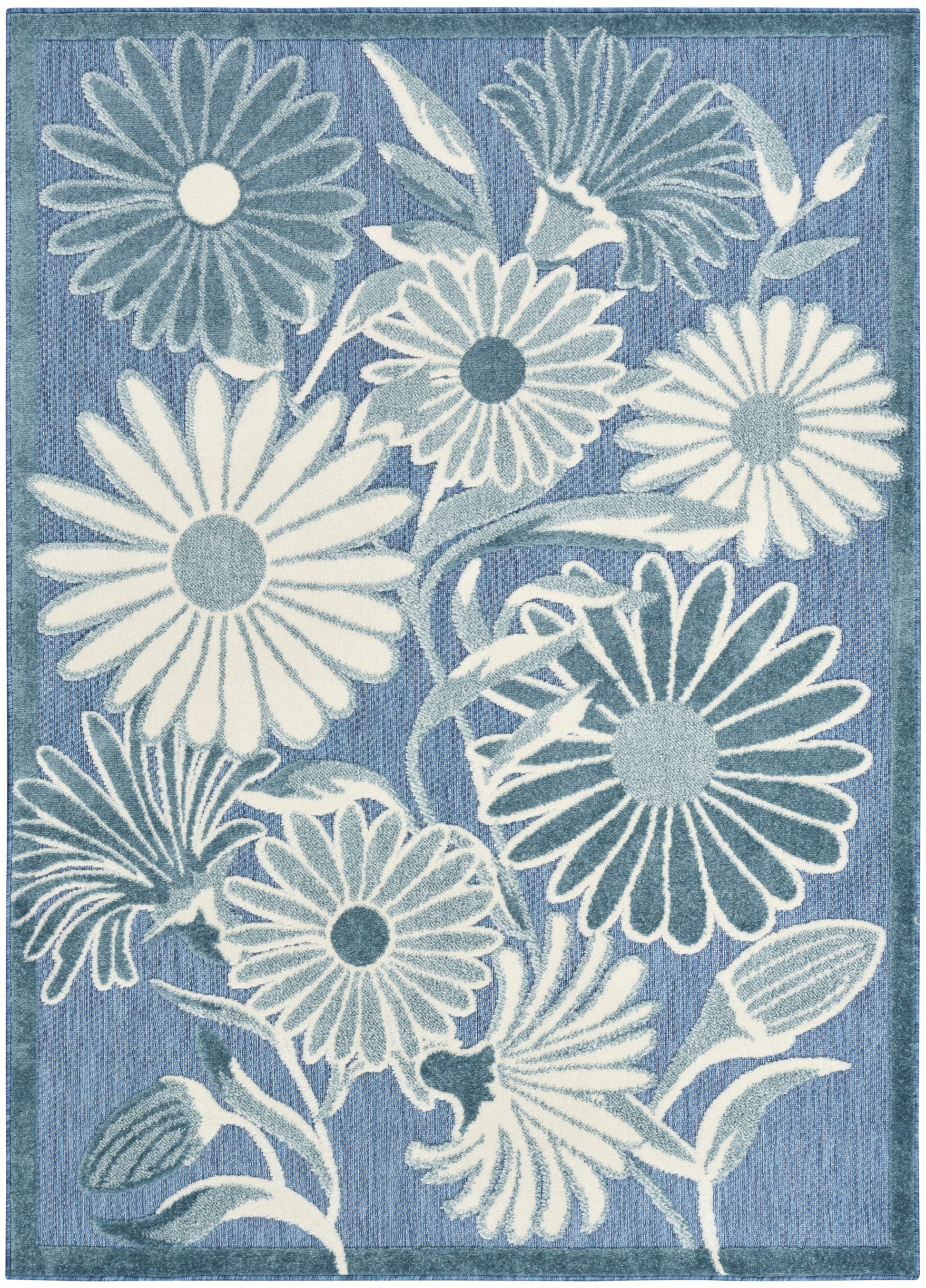 Blue floral rug with large white daisies and teal centers, textured woven pattern and darker border.