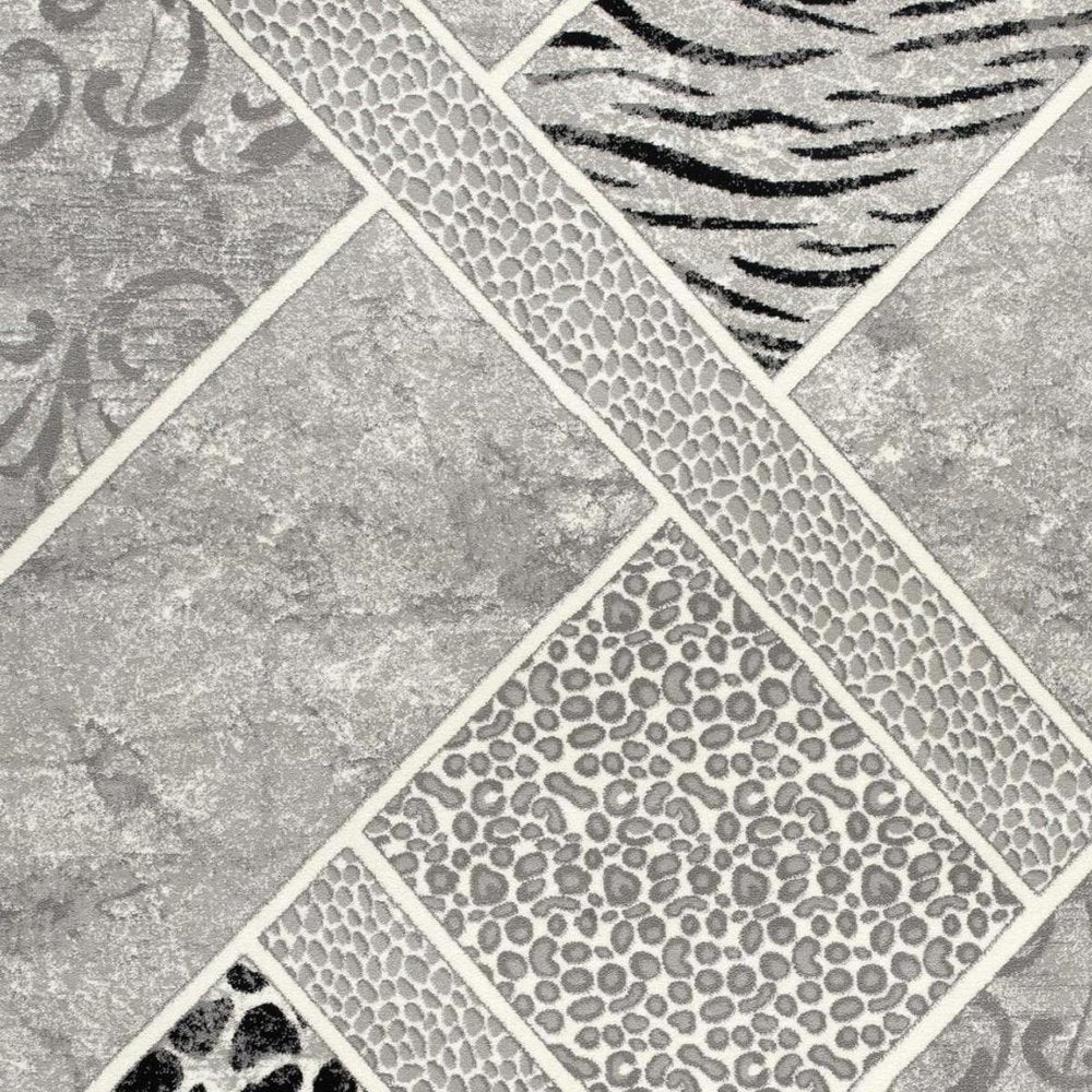 7' X 9' Grey Geometric Power Loom Stain Resistant Area Rug