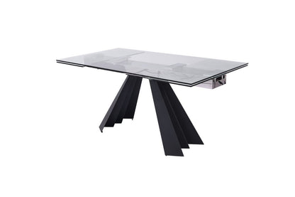 Rectangular glass-top desk with black angular pedestal legs and chrome accents.