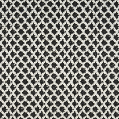 Close-up of a black and white woven rug with a tiny diamond lattice pattern; a 10' runner rug.