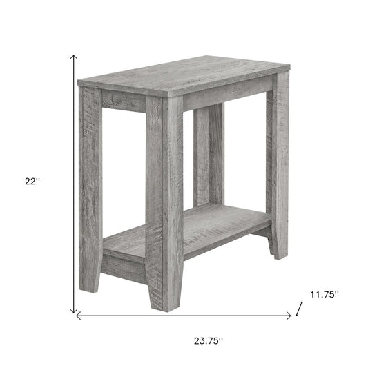Weathered gray wood console table with lower shelf and rectangular legs; 23.75in wide, 11.75in deep, 22in tall.