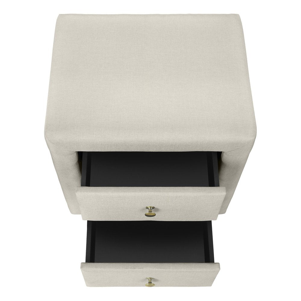 Beige linen fabric two-drawer nightstand with brass knobs and black drawer interiors, modern cube design