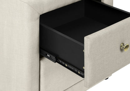 Beige wood two-drawer nightstand; one drawer pulled out showing interior, metal slides, and a brass heart knob.