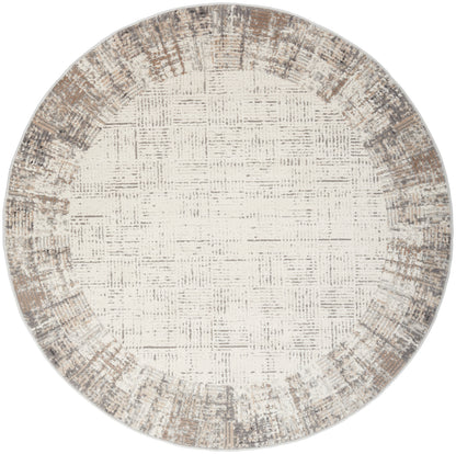 Round woven rug with cream center and distressed taupe-brown border; vintage geometric pattern for living room decor.