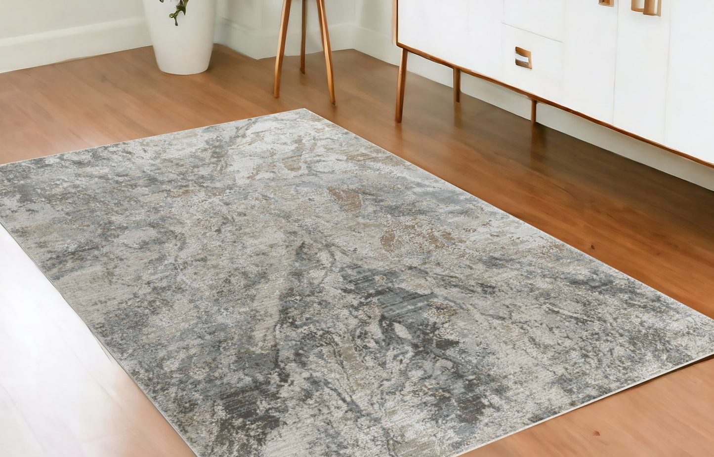 5' X 7' Beige Abstract Power Loom Area Rug