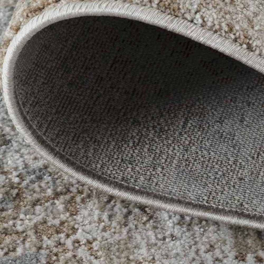 5' X 7' Beige Abstract Power Loom Area Rug