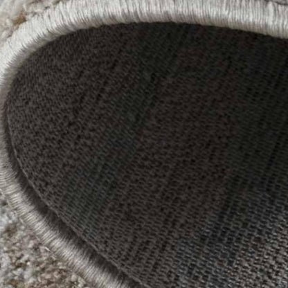 5' X 8' Beige Abstract Stain Resistant Area Rug