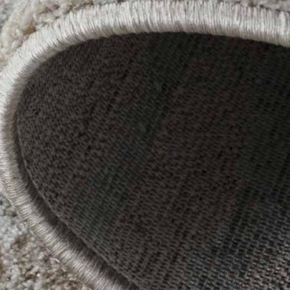 5' X 8' Beige Abstract Stain Resistant Area Rug