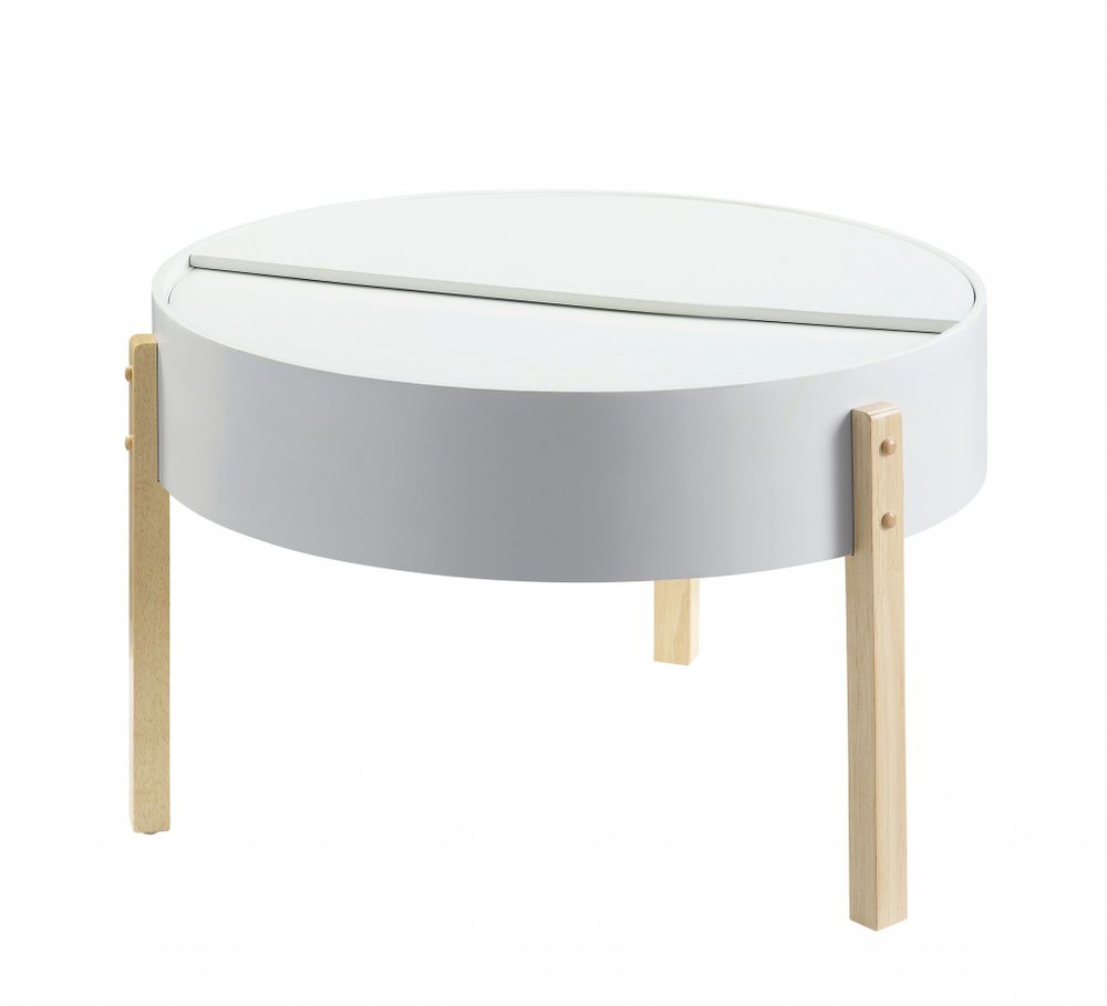 Round white coffee table with gray lift-top lid, natural wood legs, modern minimalist storage.