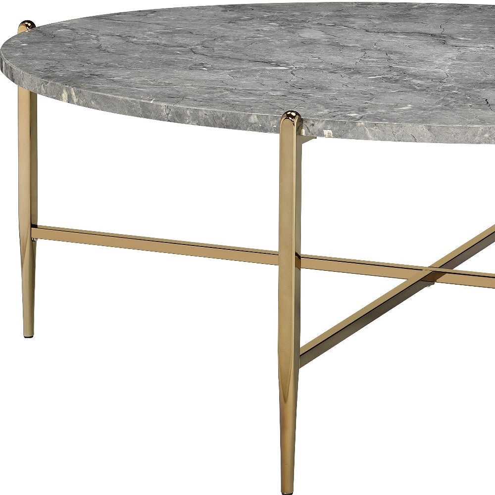 48" Gray And Champagne Faux Marble And Metal Oval Coffee Table