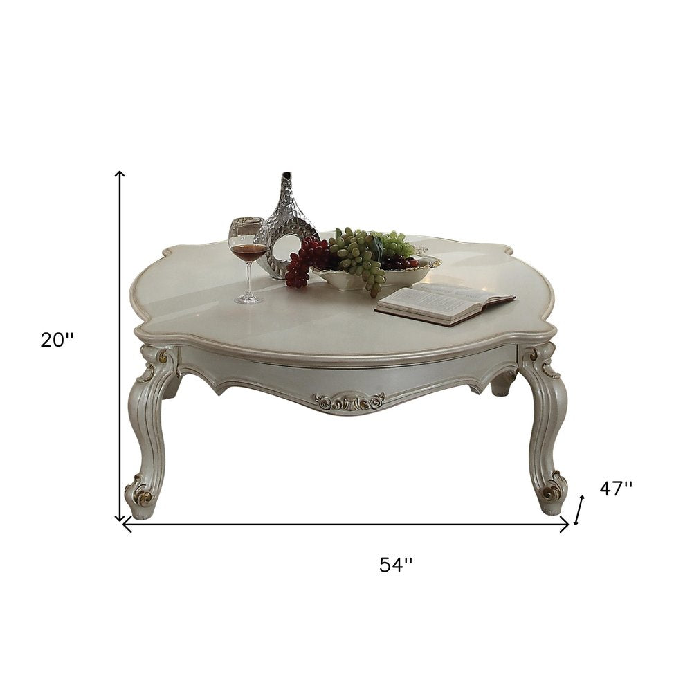 54" Pearl Wood And Polyresin Coffee Table