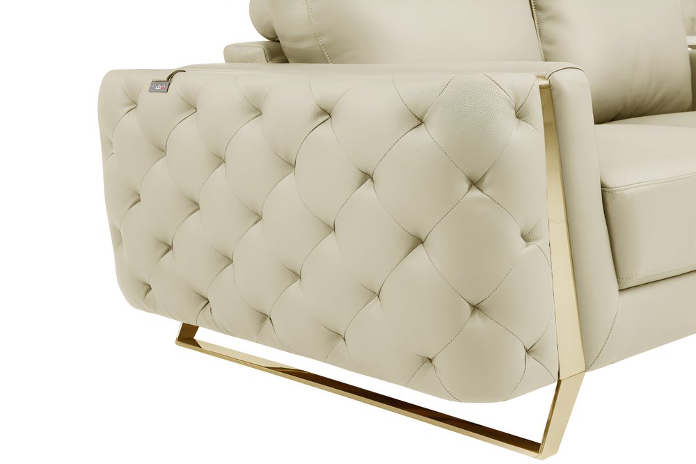 Beige Italian leather sofa with gold legs, 90" wide.