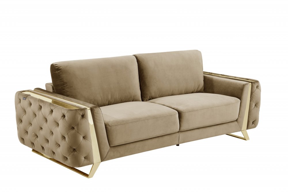 Beige velvet sofa with gold legs, 90 inches long.