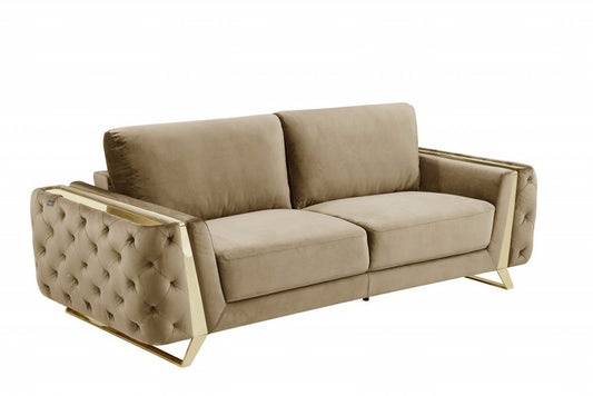 Beige velvet sofa with gold legs, 90 inches long.