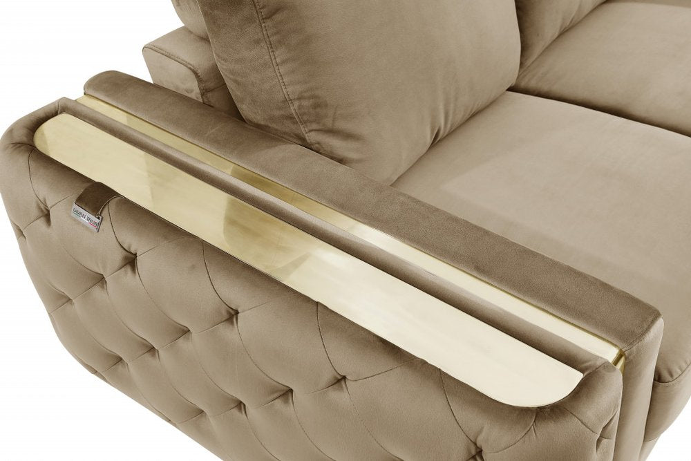 Beige velvet sofa with gold legs, 90-inch length.