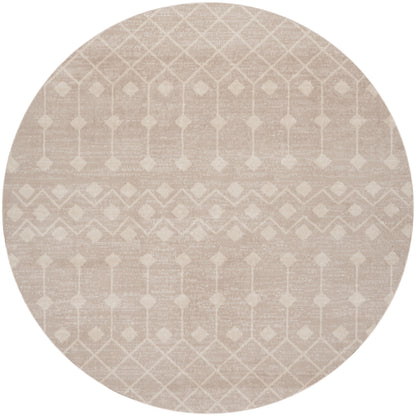 Round beige rug with cream geometric lattice and diamond motifs in a soft, textured weave.