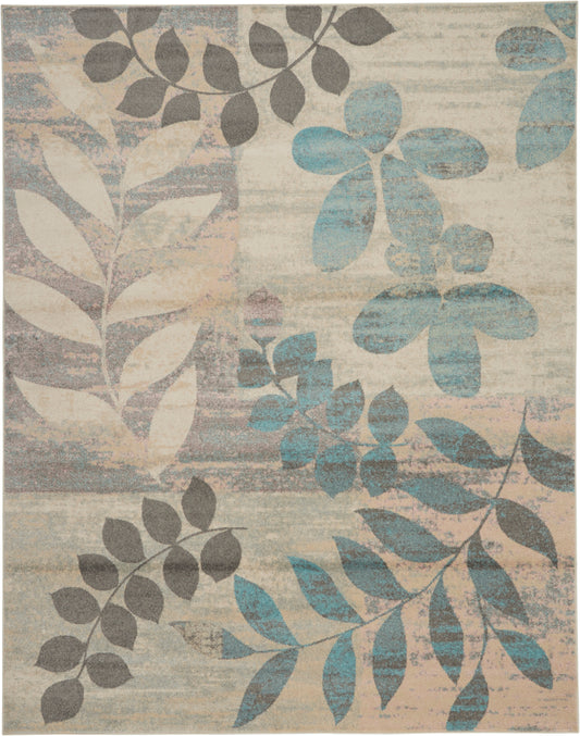 Decorative area rug featuring blue and gray leaves on a beige distressed background.
