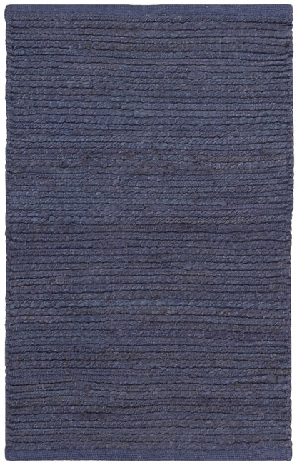 Navy blue rectangular rug with thick ribbed texture; woven.