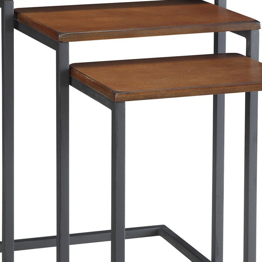 Set of Three Chestnut And Black Distressed Solid Wood And Steel Nested Tables