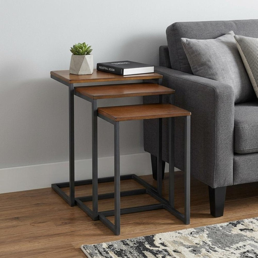 Set of Three Chestnut And Black Distressed Solid Wood And Steel Nested Tables