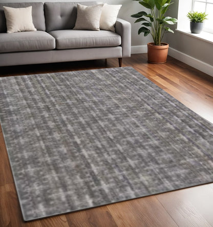 5' X 8' Brown And Dark Grey Plaid Cross Hand Loomed Area Rug
