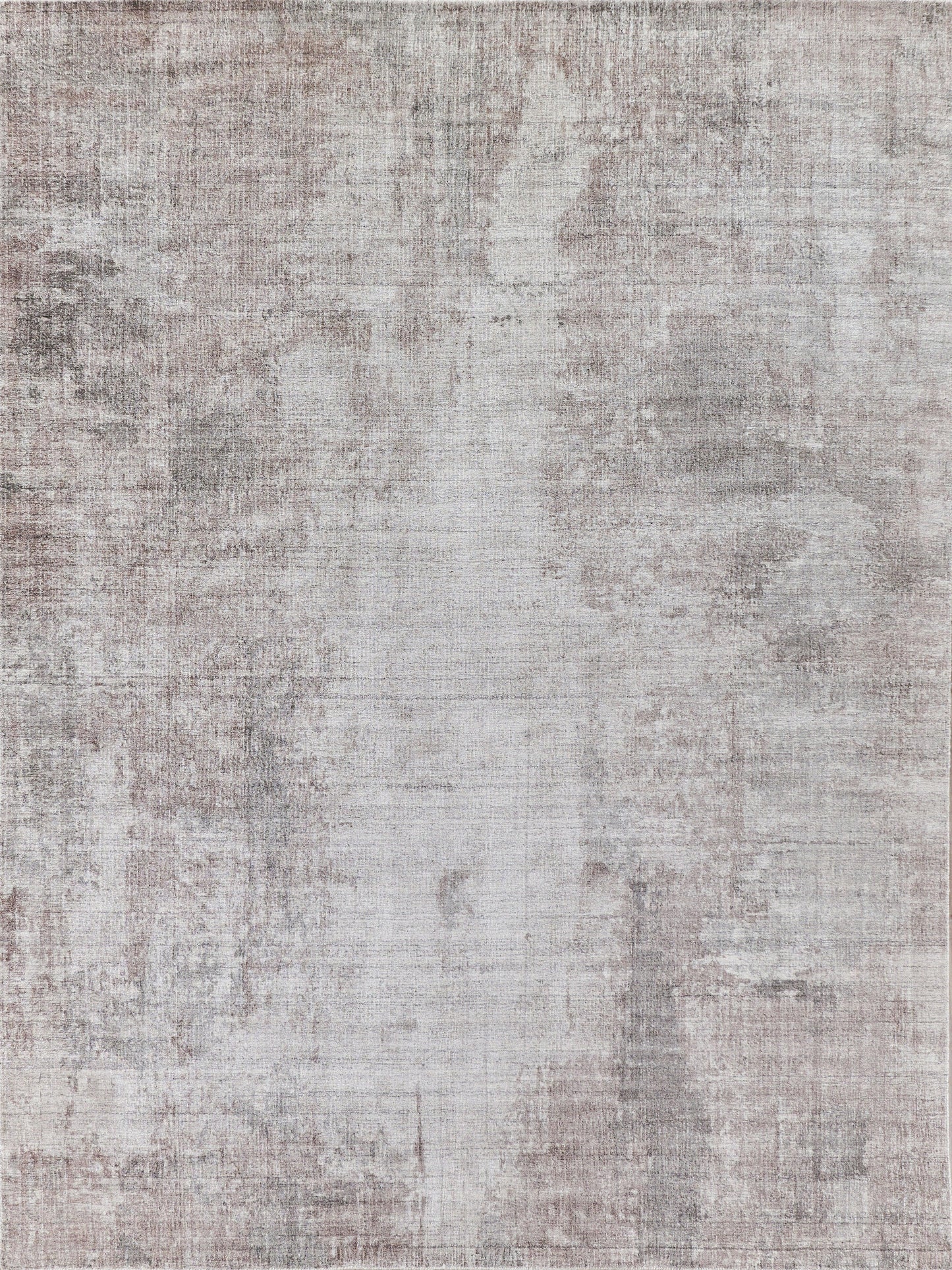 Neutral-toned abstract distressed rug with gray and beige mottled pattern and soft texture.